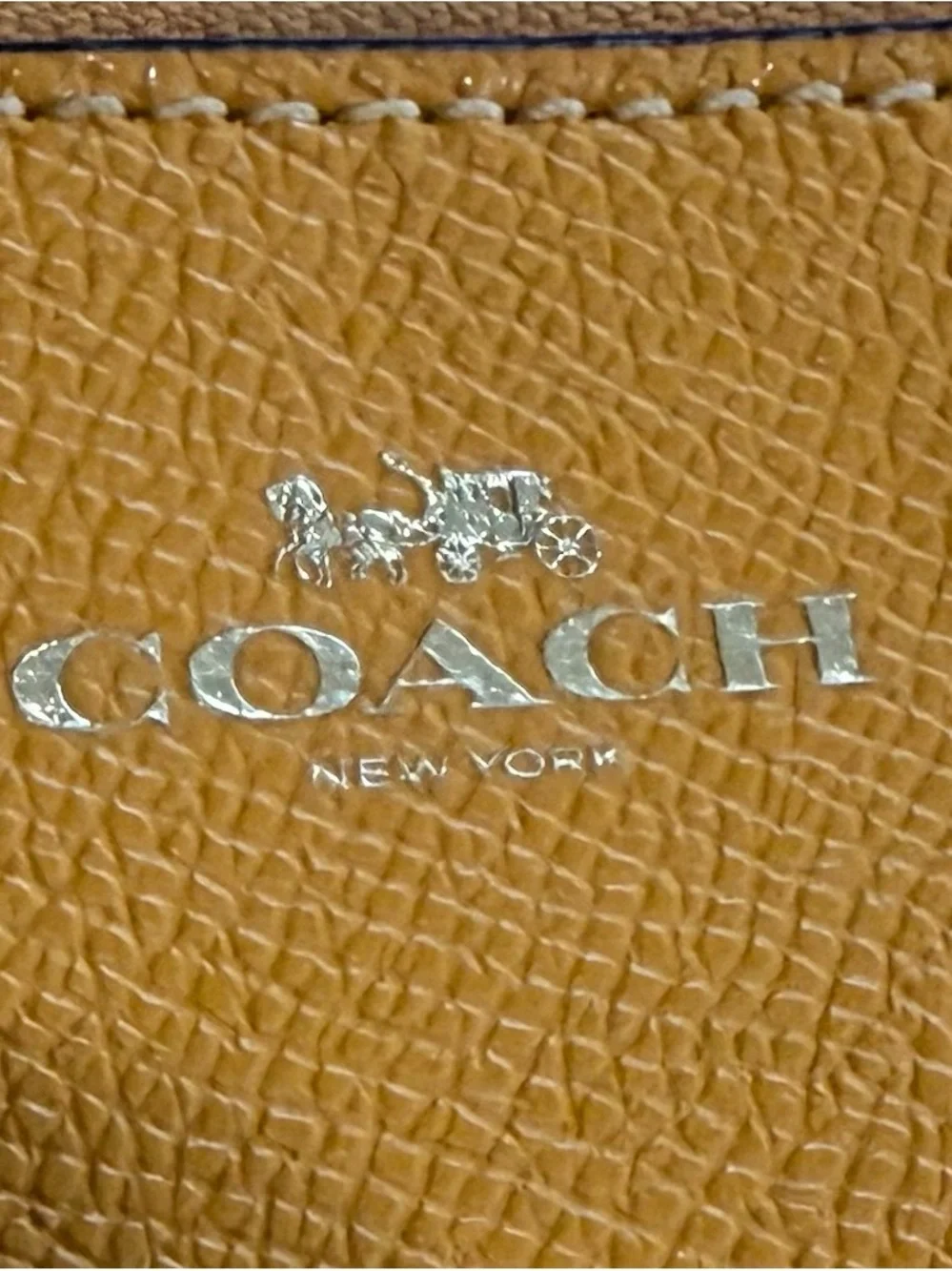 Coach Gold Leather Wristlet with Silver Logo
